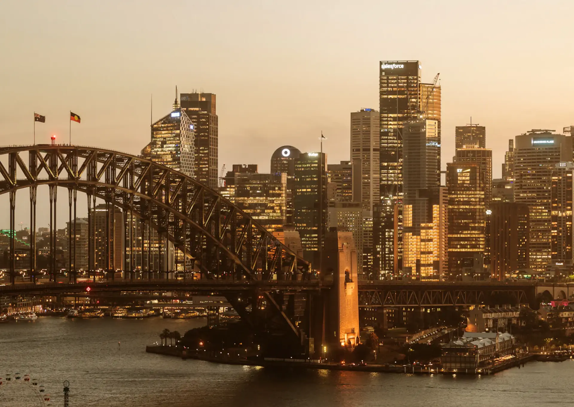 Sydney Harbour Bridge and city skyline in the evening